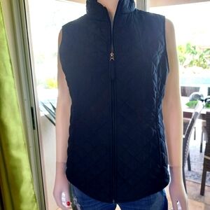 Van Heusen Ladies Quilted Zipfront Vest in a Dark Navy.